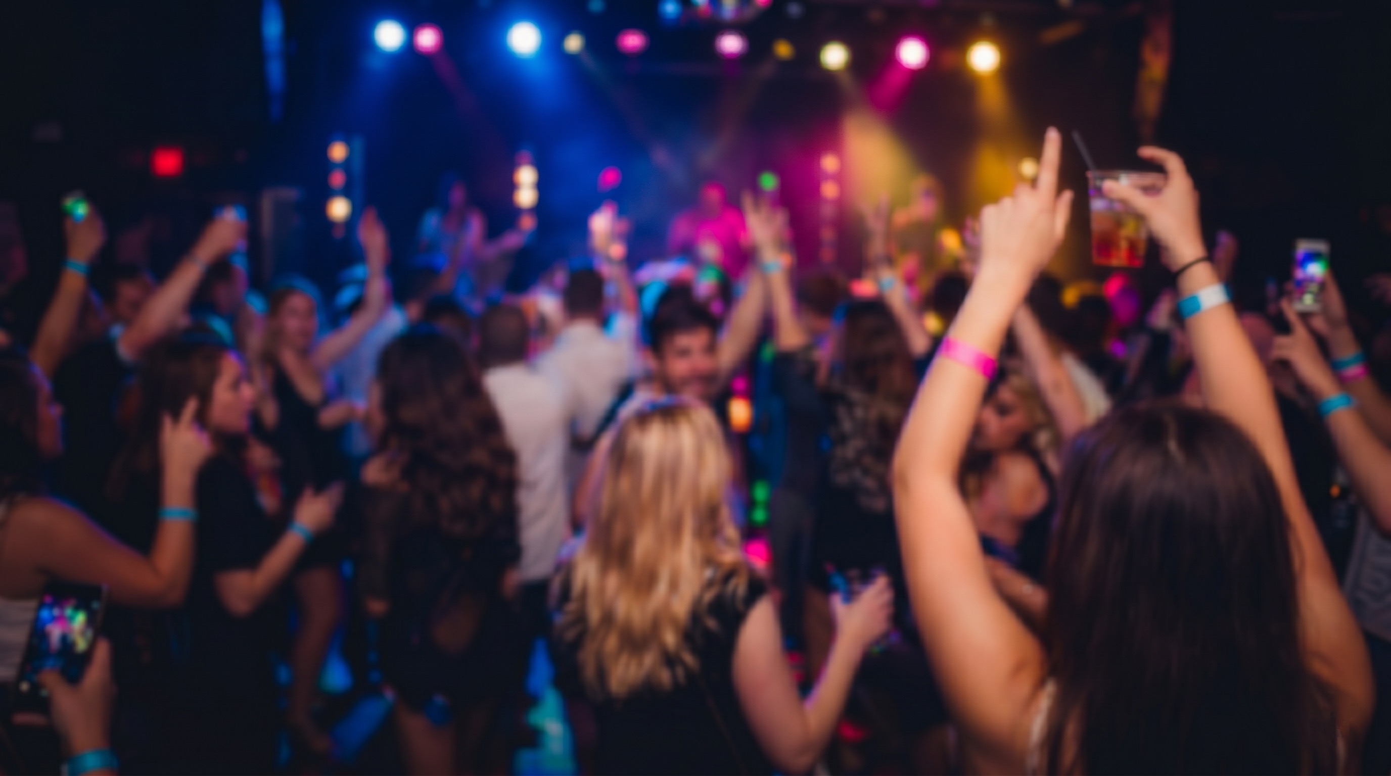 Crowd dancing at a live nightlife event